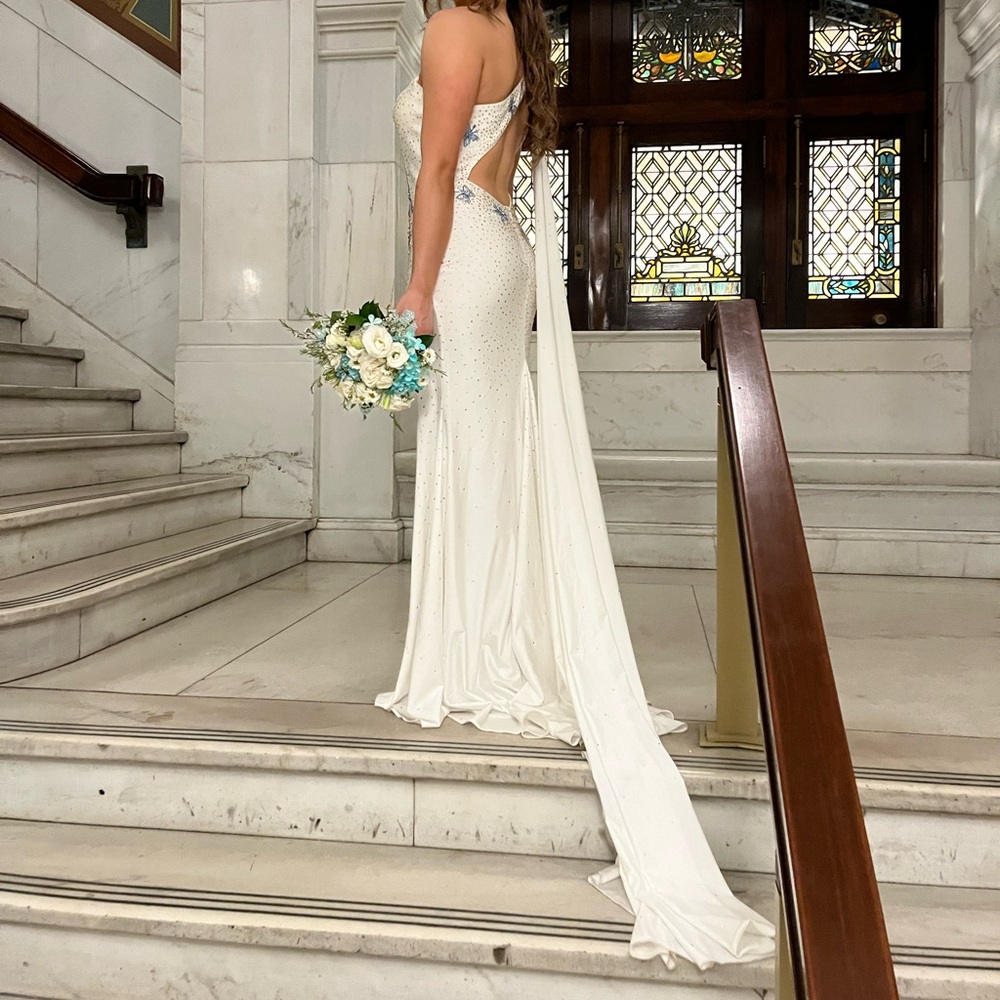 Elegant White Gown with Train